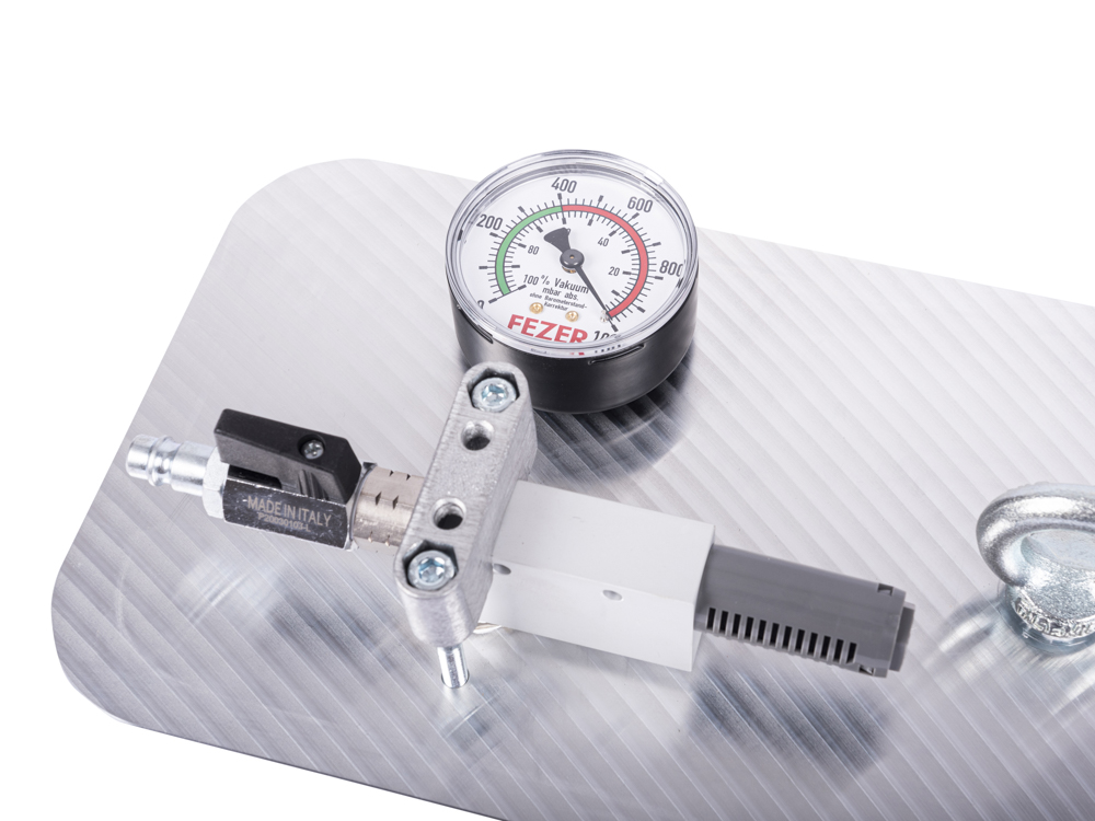 Abbildung Druckluftkupplung NW 7,2 und Vakuummeter